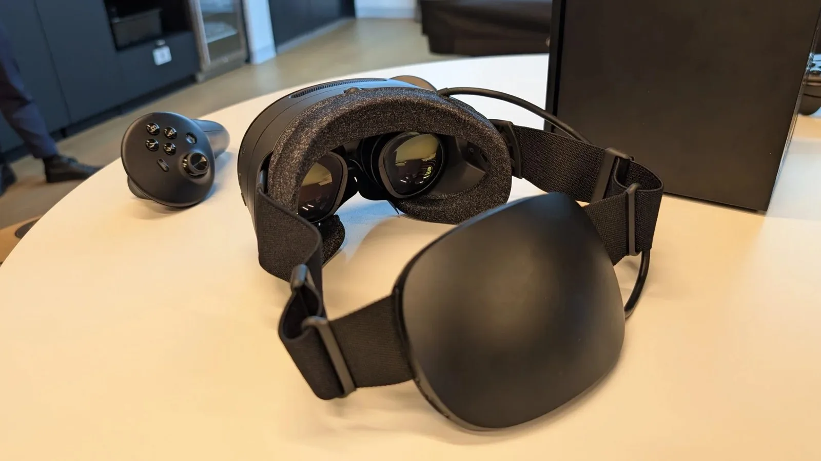 A rear view of the Steam Frame VR headset, with its lenses visible.