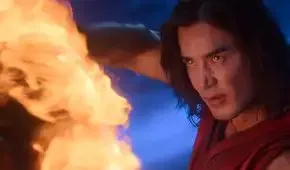 Liu Kang (Ludi Lin, a long-haired man in a red robe, looks ferocious as he blasts fire in Mortal Kombat 2