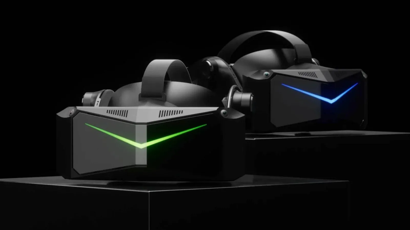 Two Pimax VR headsets against a dark background.