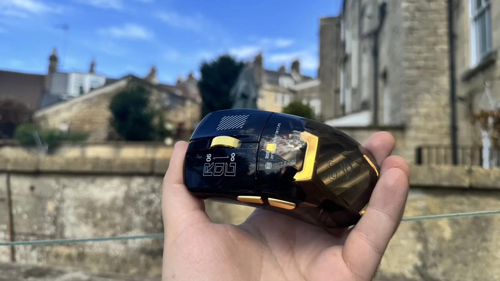 Asus ROG Harpe II Extreme Edition 20, outside in a hand, from the top