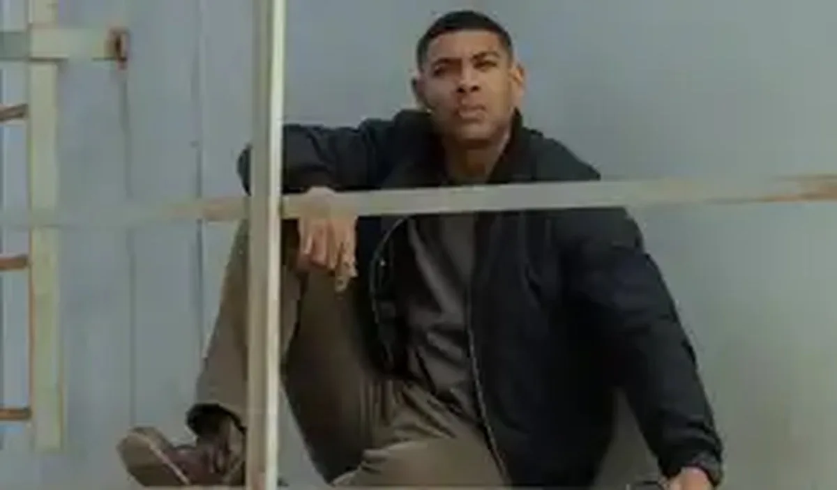 John Stewart (Aaron Pierre) sits in a tower in Lanterns