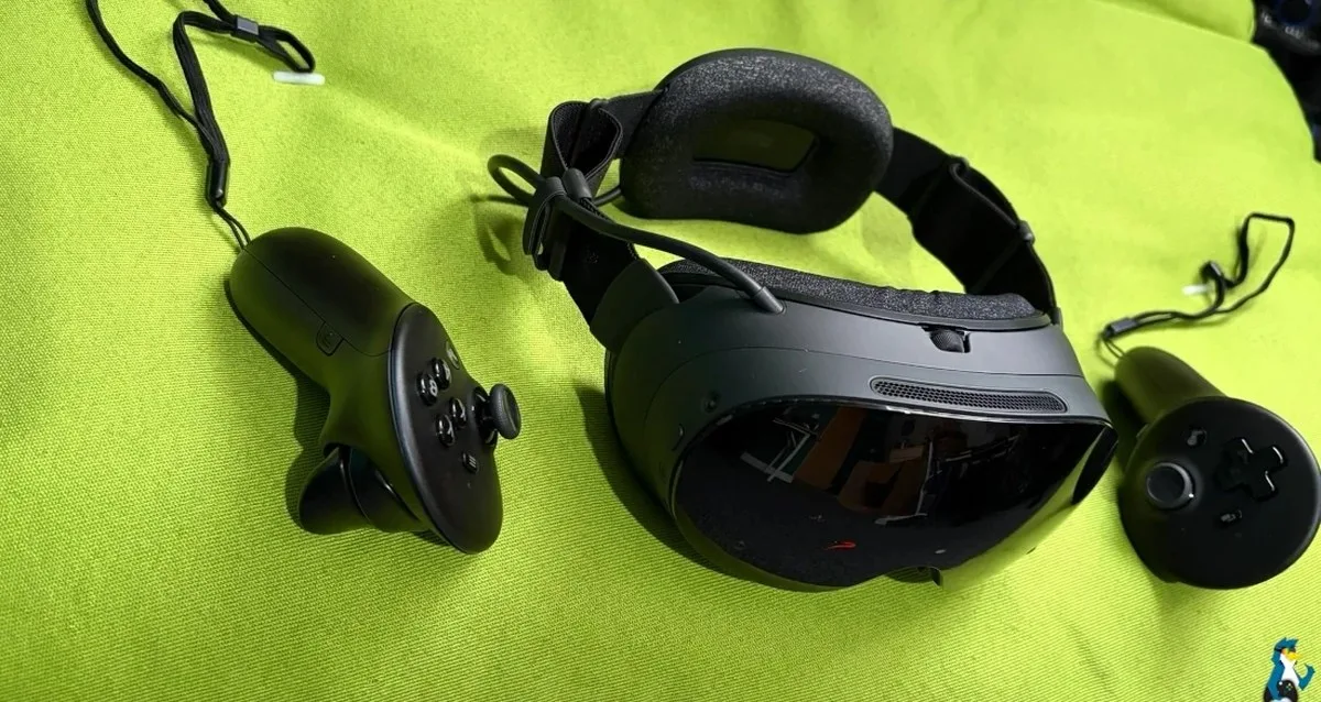 Steam Frame (middle) and Steam Frame Controllers each side