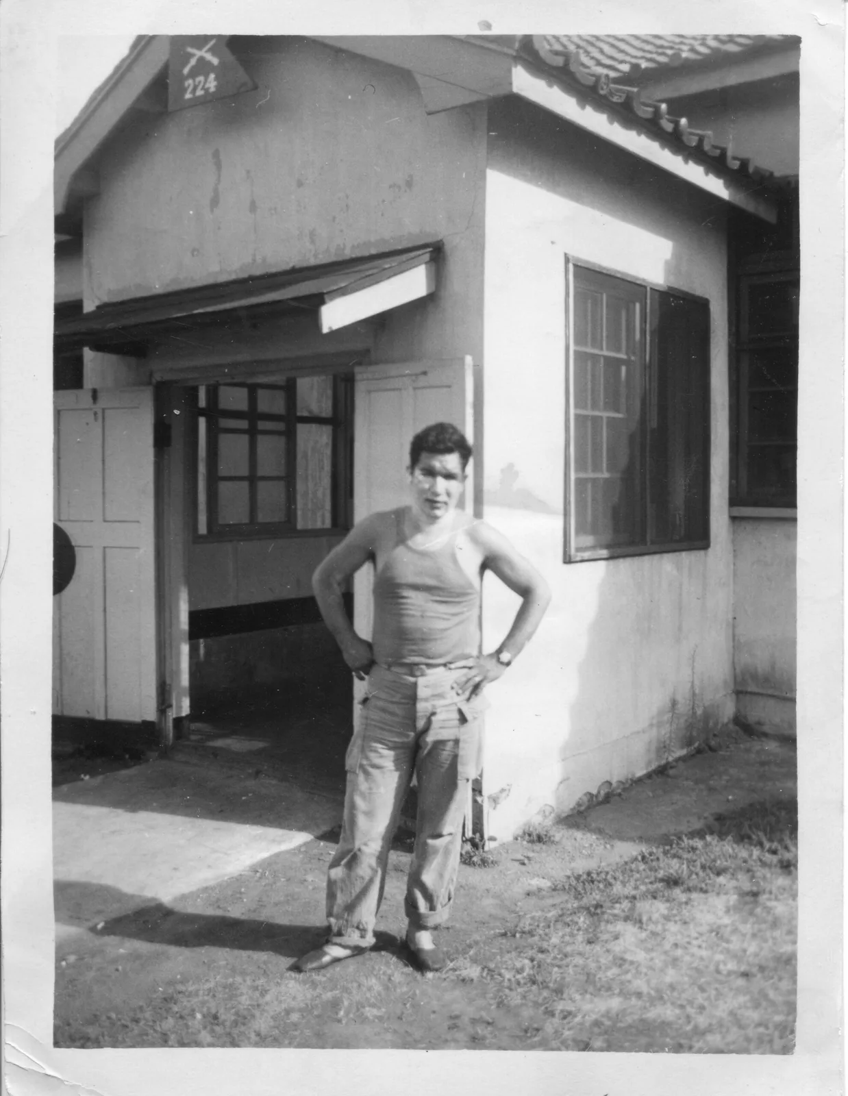 Peter Martinez stands in front of a building — 1914 Dönemi Askeri Tarih Belgesi