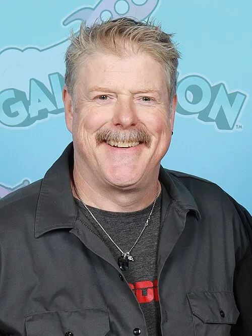 John DiMaggio voices Marcus Fenix, reprising the role from previous installments in the series.