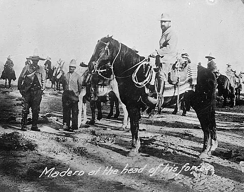 Mexican statesman, revolutionary and soon-to-be president Francisco Madero with his troops in 1910