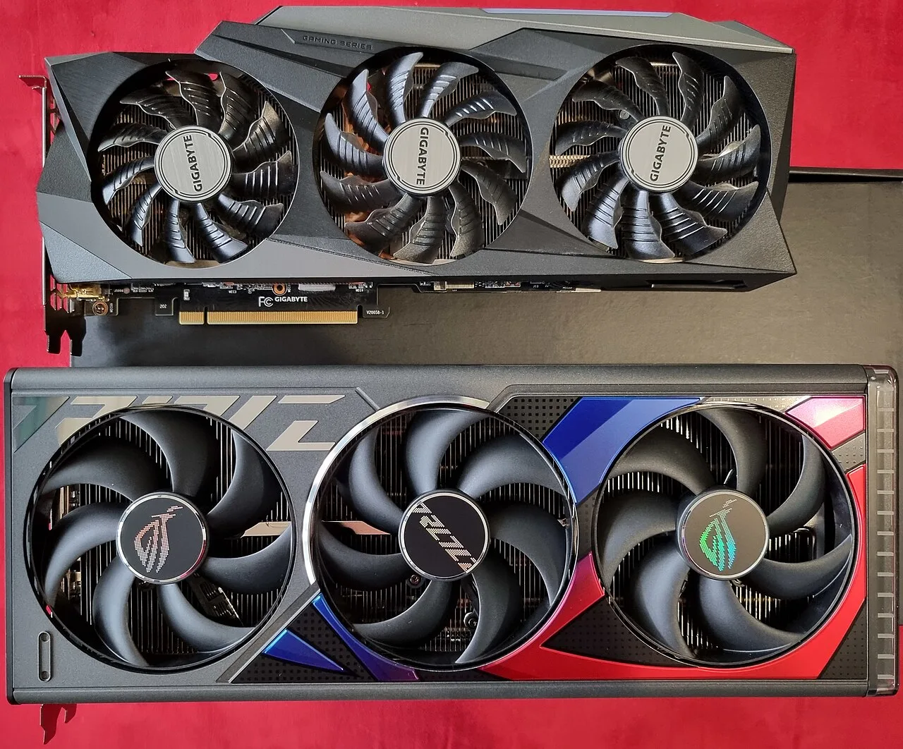 An aftermarket AIB variant of the RTX 4090 (Asus ROG Strix) on the bottom, next to an RTX 3090 (Gigabyte Gaming OC) for size comparison
